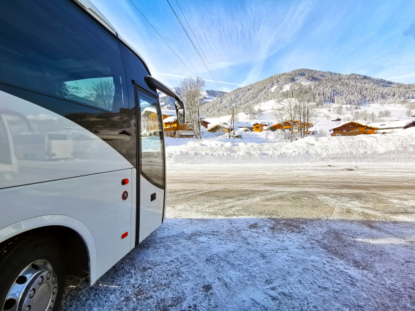 A transfer coach in a ski resort